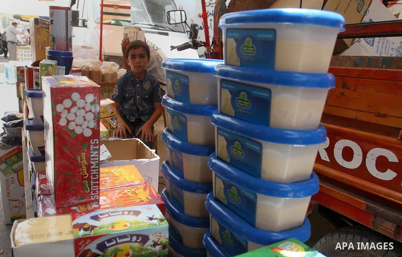 Palestinians shop at a traditional market in preparation for the holy month of Ramadan in Rafah in the southern Gaza strip on June 4,2016. Muslims around the world refrain from eating, drinking and sexual intercourse fro...