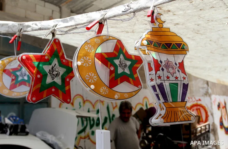 Palestinians shop at a traditional market in preparation for the holy month of Ramadan in Rafah in the southern Gaza strip on June 4,2016. Muslims around the world refrain from eating, drinking and sexual intercourse fro...