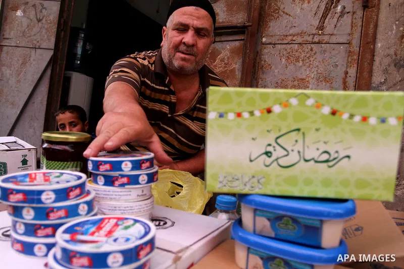 Palestinians shop at a traditional market in preparation for the holy month of Ramadan in Rafah in the southern Gaza strip on June 4,2016. Muslims around the world refrain from eating, drinking and sexual intercourse fro...