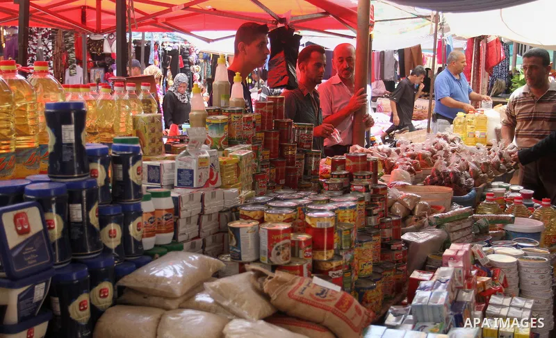 Palestinians shop at a traditional market in preparation for the holy month of Ramadan in Rafah in the southern Gaza strip on June 4,2016. Muslims around the world refrain from eating, drinking and sexual intercourse fro...