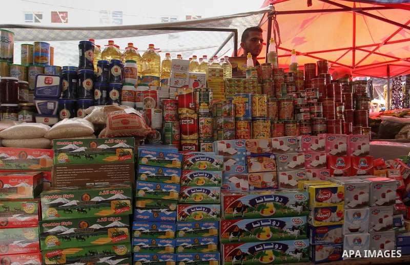 Palestinians shop at a traditional market in preparation for the holy month of Ramadan in Rafah in the southern Gaza strip on June 4,2016. Muslims around the world refrain from eating, drinking and sexual intercourse fro...