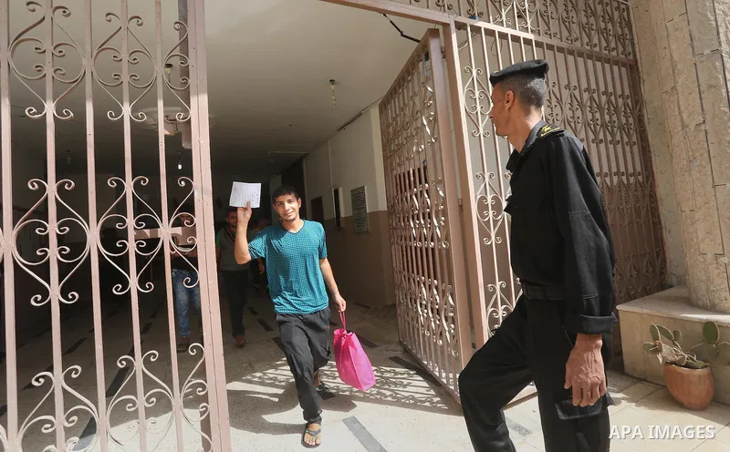Palestinian prisoners leave the prison run by the security forces in Gaza Strip, in Gaza City on June 5, 2016. Security officials in Gaza Strip said on Sunday they released 156 prisoners occasion of the Muslim holy month...