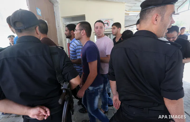 Palestinian prisoners leave the prison run by the security forces in Gaza Strip, in Gaza City on June 5, 2016. Security officials in Gaza Strip said on Sunday they released 156 prisoners occasion of the Muslim holy month...