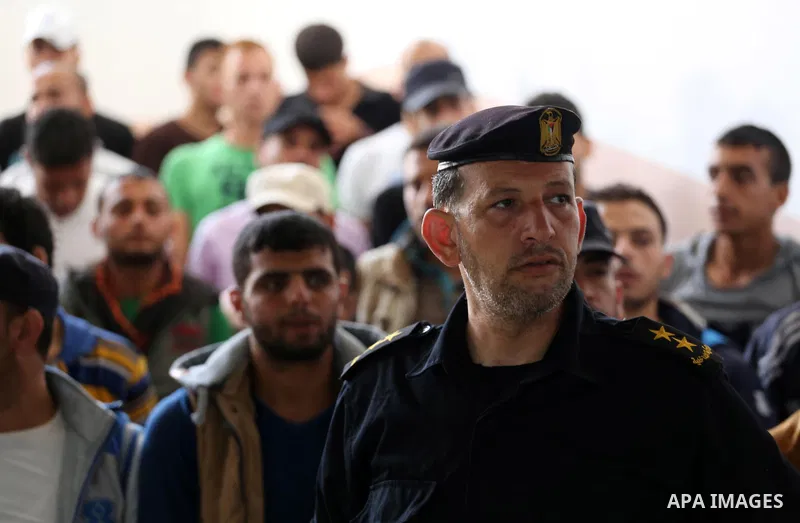 Palestinian prisoners leave the prison run by the security forces in Gaza Strip, in Gaza City on June 5, 2016. Security officials in Gaza Strip said on Sunday they released 156 prisoners occasion of the Muslim holy month...
