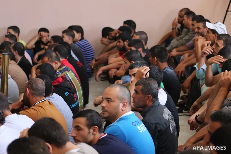 Palestinian prisoners leave the prison run by the security forces in Gaza Strip, in Gaza City on June 5, 2016. Security officials in Gaza Strip said on Sunday they released 156 prisoners occasion of the Muslim holy month...
