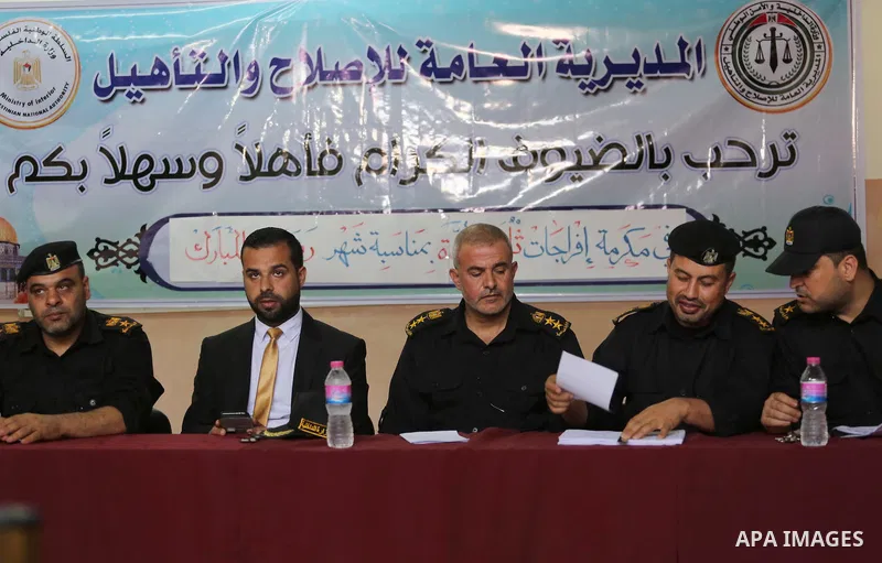 Pamestinian Members of the Ministry of Interior, attend to announce the names of prisoners, in Gaza City on June 5, 2016. Security officials in Gaza Strip said on Sunday they released 156 prisoners occasion of the Muslim...