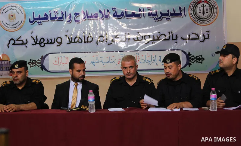 Pamestinian Members of the Ministry of Interior, attend to announce the names of prisoners, in Gaza City on June 5, 2016. Security officials in Gaza Strip said on Sunday they released 156 prisoners occasion of the Muslim...
