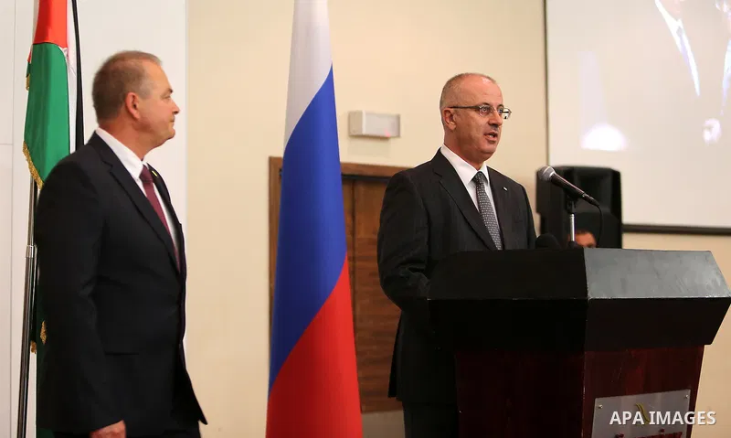 Palestinian Prime Minister Rami Hamdallah speaks during Russian national day ceremony in the West Bank city of Ramallah, on June 05, 2016. Photo by Prime Minister Office