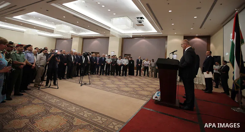 Palestinian Prime Minister Rami Hamdallah speaks during Russian national day ceremony in the West Bank city of Ramallah, on June 05, 2016. Photo by Prime Minister Office