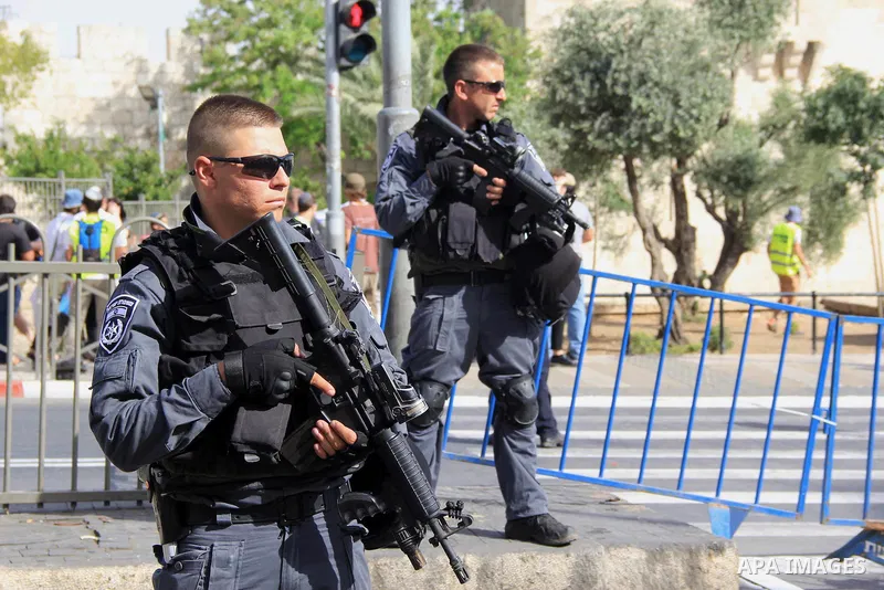 Israeli security forces stand guard during an annual march marking Israel's 1967 seizure of the Palestinian-dominated eastern half of Jerusalem, outside Damascus Gate in Jerusalem's old city on June 5, 2016. Israel occup...