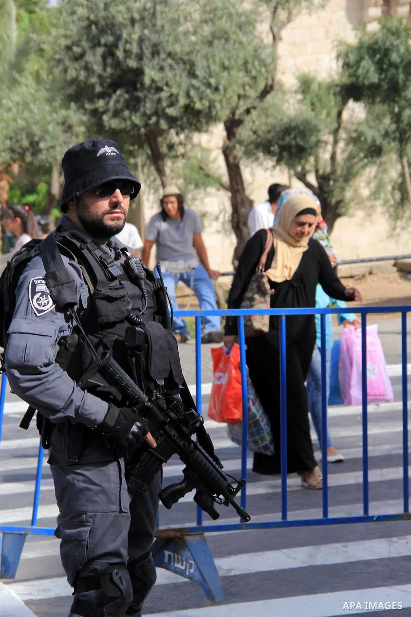 Israeli security forces stand guard during an annual march marking Israel's 1967 seizure of the Palestinian-dominated eastern half of Jerusalem, outside Damascus Gate in Jerusalem's old city on June 5, 2016. Israel occup...