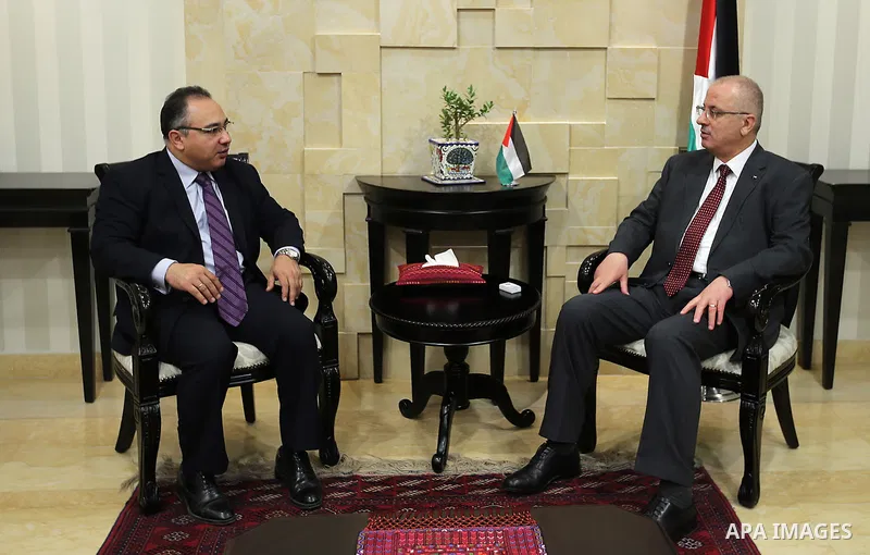 Palestinian prime minister Rami Hamdallah meets Egyptian Ambassador , Wael Nasr Eddine, in the West Bank city of Ramallah, on June 6, 2016. Photo by Prime Minister Office