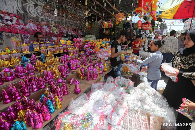 A Palestinian vendor displays traditional lanterns known in Arabic as "Fanous" at a market on the first day of the Ramadan, in Gaza city, on June 6, 2016 as the faithful prepare to start fasting. More than 1.5 billion Mu...