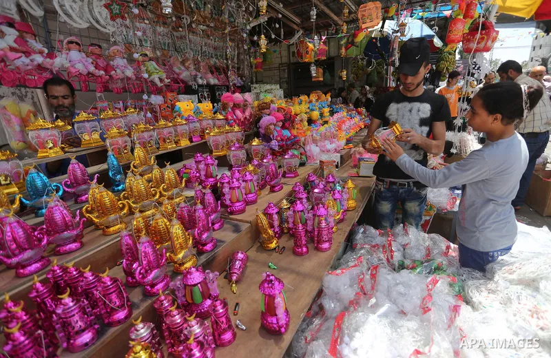 A Palestinian vendor displays traditional lanterns known in Arabic as "Fanous" at a market on the first day of the Ramadan, in Gaza city, on June 6, 2016 as the faithful prepare to start fasting. More than 1.5 billion Mu...