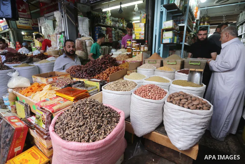 Palestinians shop at a market on the first day of the Ramadan, in Gaza city, on June 6, 2016 as the faithful prepare to start fasting. More than 1.5 billion Muslims around the world will start to celebrate Ramadan the fi...