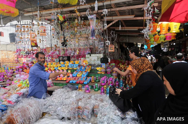 A Palestinian vendor displays traditional lanterns known in Arabic as "Fanous" at a market on the first day of the Ramadan, in Gaza city, on June 6, 2016 as the faithful prepare to start fasting. More than 1.5 billion Mu...