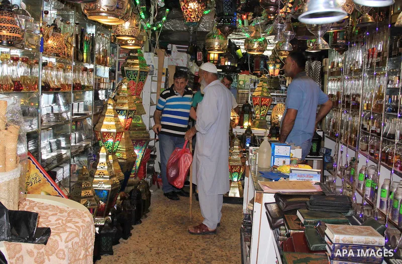 A Palestinian vendor displays traditional lanterns known in Arabic as "Fanous" at a market in Jerusalem's old city on June 6, 2016 on the first day of the Ramadan,. More than 1.5 billion Muslims around the world will sta...