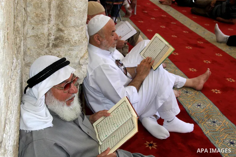 Palestinians Muslims read holy Koran, Islam's holy book at al-Aqsa mosque, in Jerusalem's old city on June 6, 2016 on the first day of the Ramadan,. More than 1.5 billion Muslims around the world will start to celebrate...