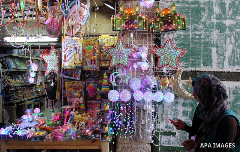 A Palestinian vendor displays traditional lanterns known in Arabic as "Fanous" at a market in Jerusalem's old city on June 7, 2016. Ramadan is sacred to Muslims because it is during that month that tradition says the Kor...