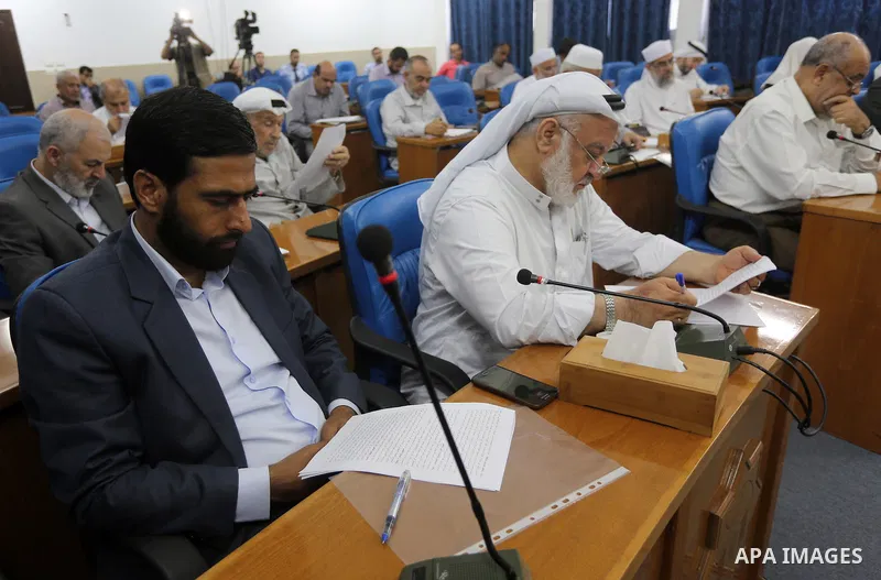 Members of the Palestinian legislative council from Hamas movement attend a meeting at the legislative council in Gaza city on June 8, 2016. Photo by Mohammed Asad