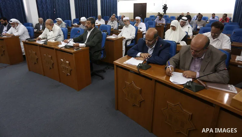 Members of the Palestinian legislative council from Hamas movement attend a meeting at the legislative council in Gaza city on June 8, 2016. Photo by Mohammed Asad
