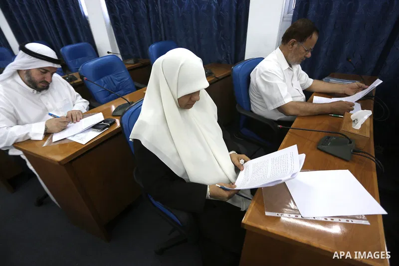 Members of the Palestinian legislative council from Hamas movement attend a meeting at the legislative council in Gaza city on June 8, 2016. Photo by Mohammed Asad