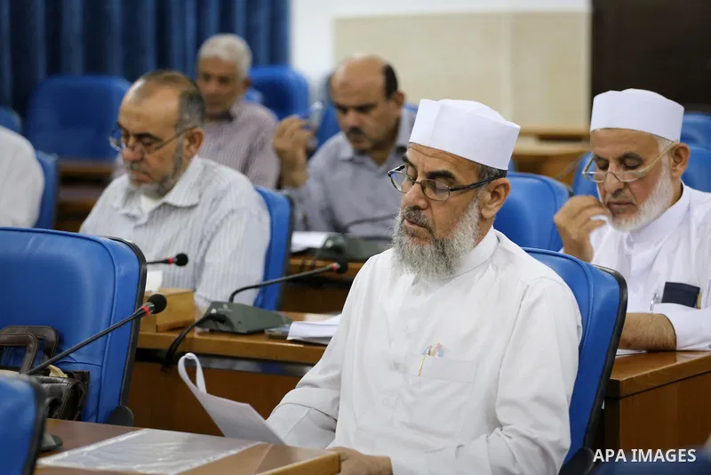 Members of the Palestinian legislative council from Hamas movement attend a meeting at the legislative council in Gaza city on June 8, 2016. Photo by Mohammed Asad