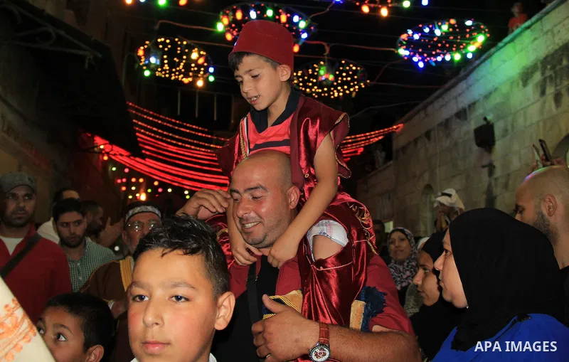 Muslim Sufis play musical instruments as they parade through the streets during the holy month of Ramadan in Jerusalem's old city, 08 June 2015. Ramadan is sacred to Muslims because it is during that month that tradition...