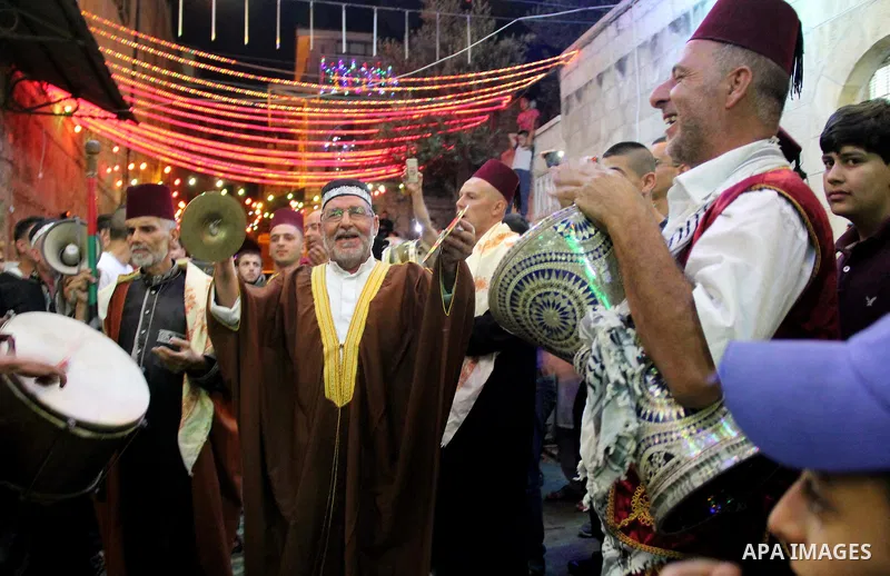 Muslim Sufis play musical instruments as they parade through the streets during the holy month of Ramadan in Jerusalem's old city, 08 June 2015. Ramadan is sacred to Muslims because it is during that month that tradition...