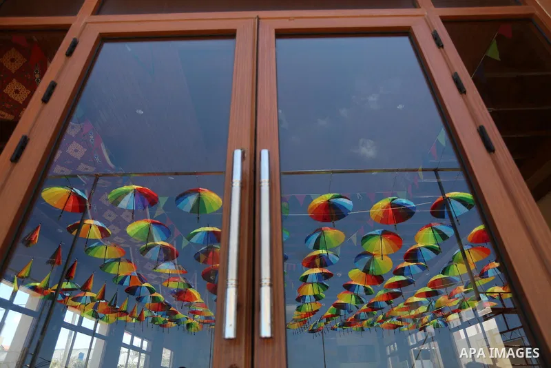 A Picture taken in June 9, 2016 shows beachside café shop was decorate its terrace with hanging colourful umbrellas as part of decorations for the Muslim holy fasting month of Ramadan in Gaza City. Ramadan is sacred to M...