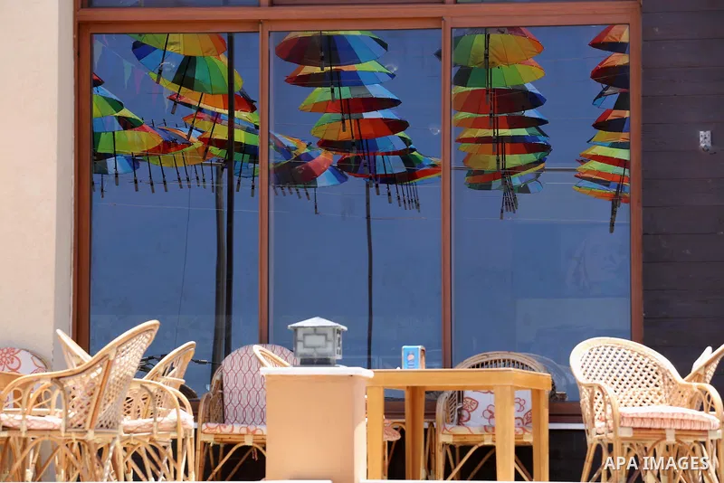 A Picture taken in June 9, 2016 shows beachside café shop was decorate its terrace with hanging colourful umbrellas as part of decorations for the Muslim holy fasting month of Ramadan in Gaza City. Ramadan is sacred to M...
