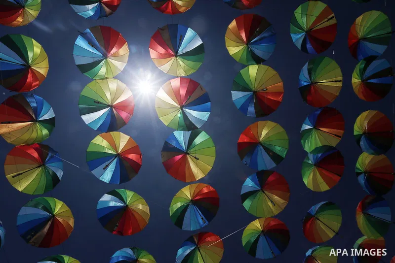 A Picture taken in June 9, 2016 shows beachside café shop was decorate its terrace with hanging colourful umbrellas as part of decorations for the Muslim holy fasting month of Ramadan in Gaza City. Ramadan is sacred to M...