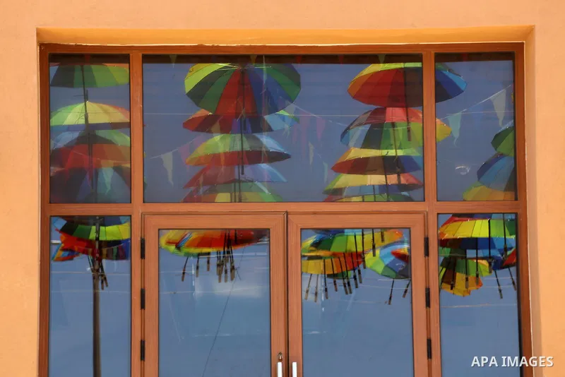 A Picture taken in June 9, 2016 shows beachside café shop was decorate its terrace with hanging colourful umbrellas as part of decorations for the Muslim holy fasting month of Ramadan in Gaza City. Ramadan is sacred to M...