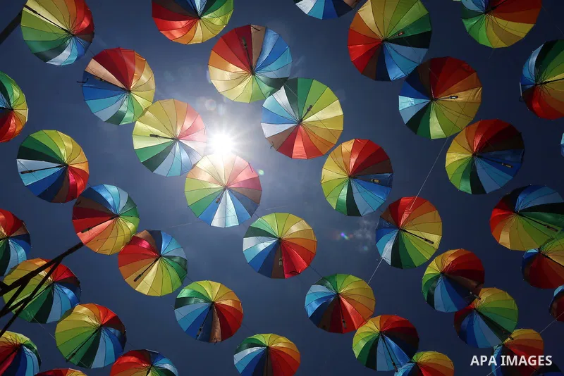 A Picture taken in June 9, 2016 shows beachside café shop was decorate its terrace with hanging colourful umbrellas as part of decorations for the Muslim holy fasting month of Ramadan in Gaza City. Ramadan is sacred to M...
