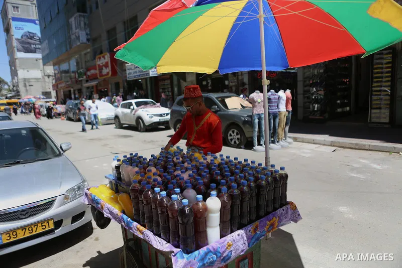 A Palestinian vendor sells juice at a market on the holy month of Ramadan in the West bank city of Ramallah, on June 09, 2016. Ramadan is sacred to Muslims because it is during that month that tradition says the Koran wa...