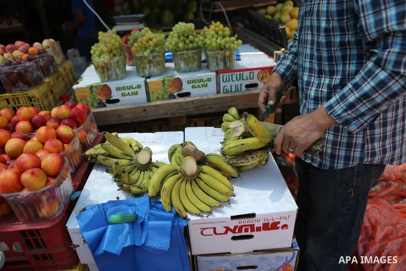 A Palestinian vendor sells fruits at a market on the holy month of Ramadan in the West bank city of Ramallah, on June 09, 2016. Ramadan is sacred to Muslims because it is during that month that tradition says the Koran w...
