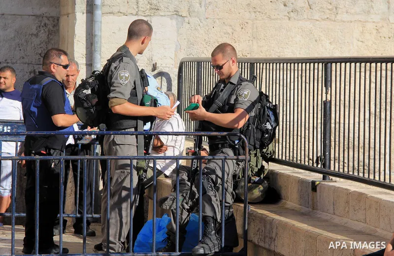 Israeli policemen stand guard at the Al-Aqsa Mosque, in Jerusalem, on June 9, 2016. Photo by Mahfouz Abu Turk