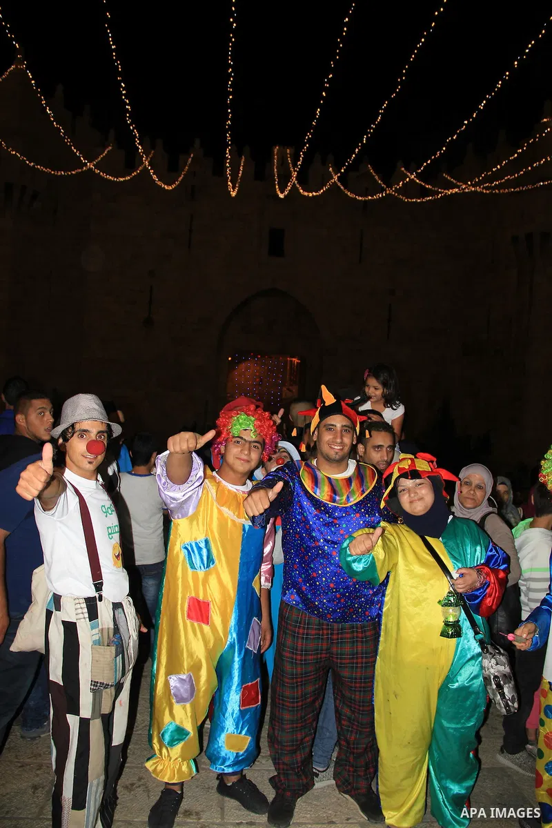 Palestinians celebrate during the holy month of Ramadan in Jerusalem's old city, on June 9, 2016. Ramadan is sacred to Muslims because it is during that month that tradition says the Koran was revealed to the Prophet Moh...