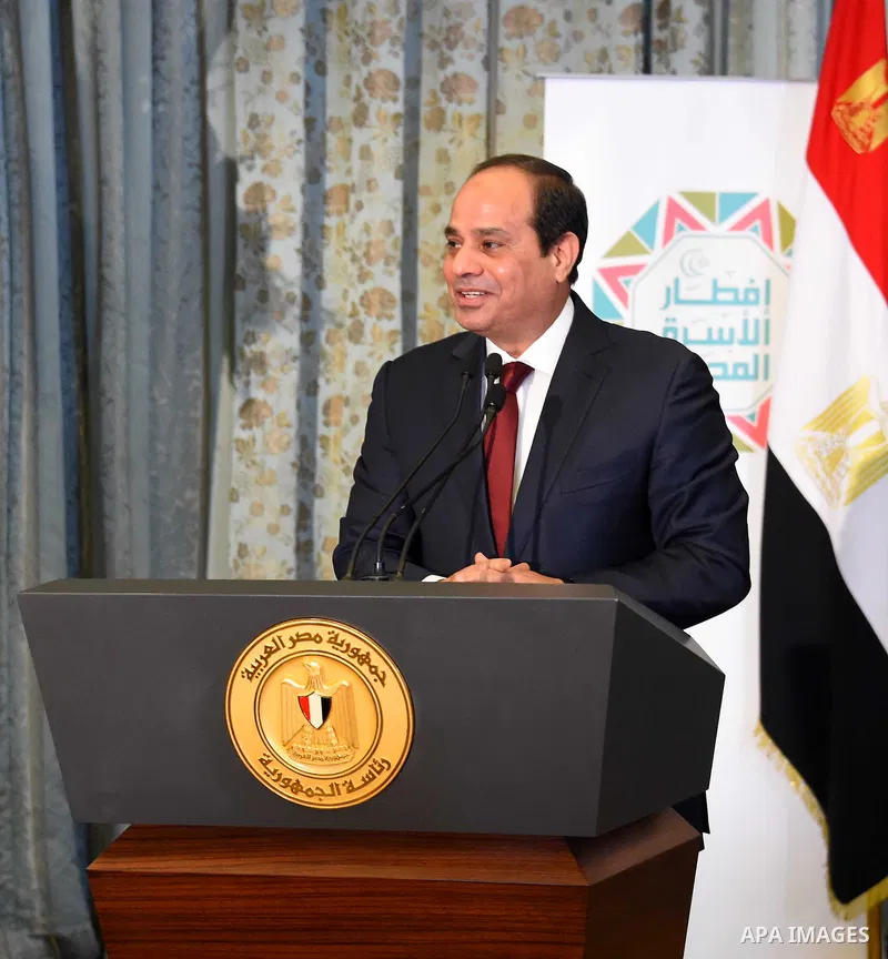 Egyptian President Abdel-Fattah al-Sisi takes part in the Egyptian family breakfast, as he celebrates the Muslim holy month of Ramadan, in Cairo, on June 11, 2016. Photo by Egyptian President Office