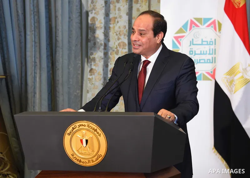 Egyptian President Abdel-Fattah al-Sisi takes part in the Egyptian family breakfast, as he celebrates the Muslim holy month of Ramadan, in Cairo, on June 11, 2016. Photo by Egyptian President Office