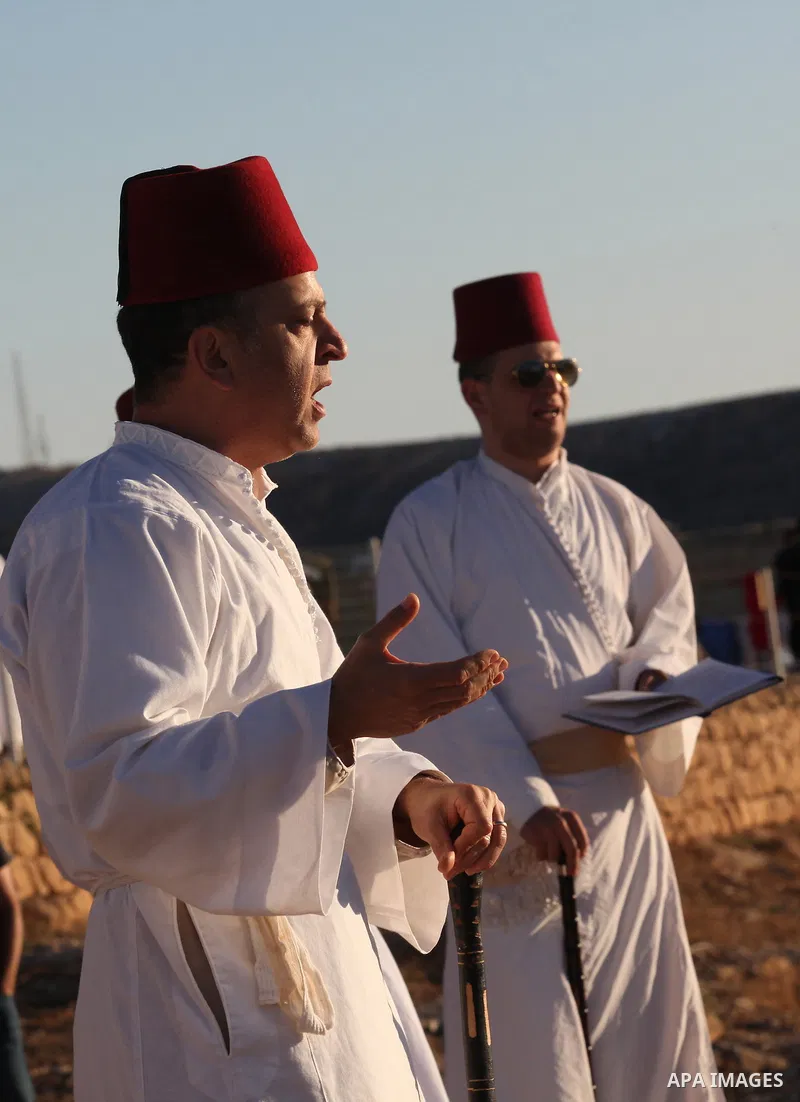 Members of the Samaritan sect take part in a traditional pilgrimage marking the holiday of Shavuot, atop Mount Gerizim near the West Bank city of Nablus early June 12, 2016. Photo by Nedal Eshtayah