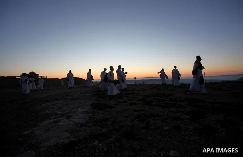 Members of the Samaritan sect take part in a traditional pilgrimage marking the holiday of Shavuot, atop Mount Gerizim near the West Bank city of Nablus early June 12, 2016. Photo by Nedal Eshtayah