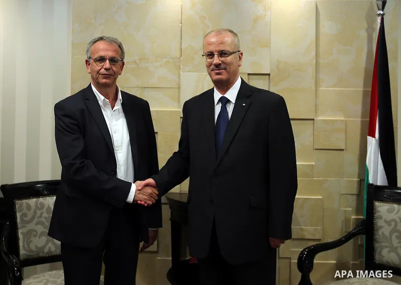 Palestinian Prime Minister Rami Hamdallah meets with a delegation from the Greek Syriza party, in the West Bank city of Ramallah on June 12, 2016. Photo by Prime Minister Office