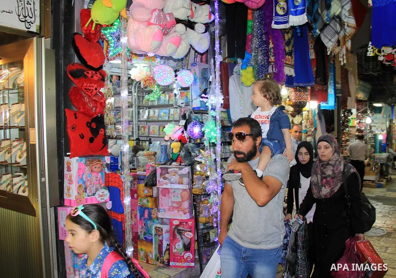 Palestinians shop at a market during the Muslim holy fasting month of Ramadan in Jerusalem's old city on June, 12, 2016. Ramadan is sacred to Muslims because it is during that month that tradition says the Koran was reve...