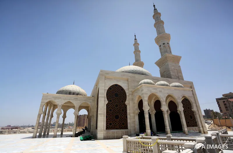 Palestinians pray at the al-Khaldi mosque during the Muslim fasting month of Ramadan, in Gaza City on June 13, 2016. Photo by Mohammed Asad