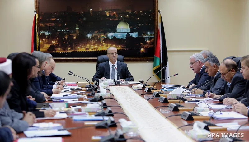 Palestinian Prime Minister, Rami Hamdallah, chairs a meeting of the Council of Ministers, in the West Bank city of Ramallah, on June 14, 2016. Photo by Prime Minister Office