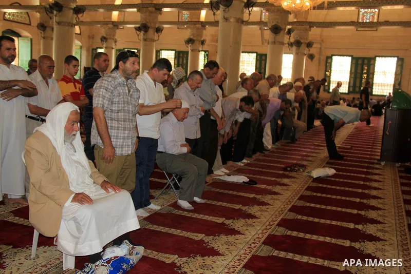Palestinian Muslim worshipers perform "Taraweeh", nightly prayer of the month of Ramadan at al-Aqsa mosque, in Jerusalem's old city on June 14, 2016. Ramadan is sacred to Muslims because it is during that month that trad...