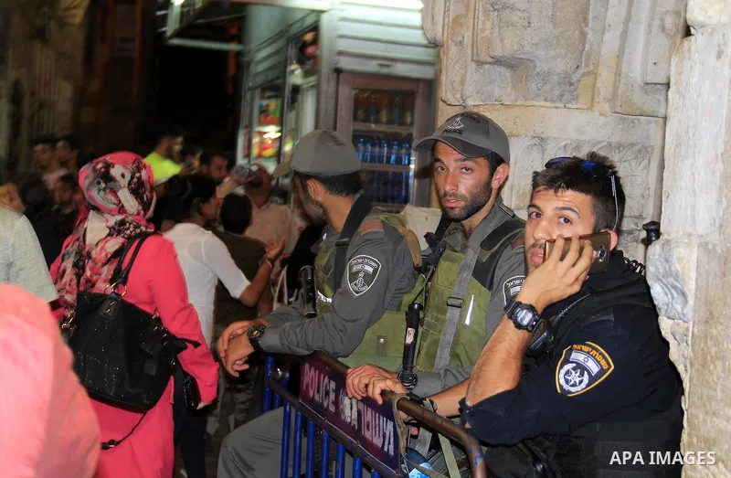 Israeli police stand guard following "Taraweeh", nightly prayer of the month of Ramadan, at al-Aqsa mosque, in Jerusalem's old city on June 14, 2016. Ramadan is sacred to Muslims because it is during that month that trad...