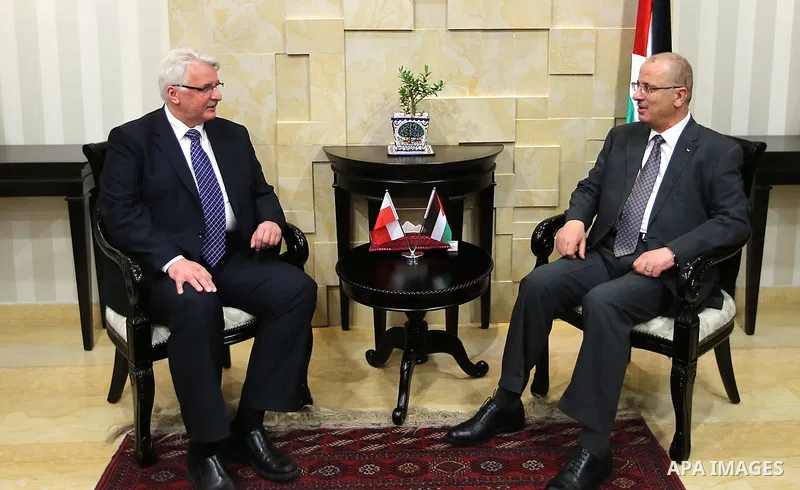 Palestinian Prime Minister, Rami Hamdallah meets with Poland's foreign minister, Witold Waszczykowski, in the West Bank city of Ramallah, June 15, 2016. Photo by Prime Minister Office