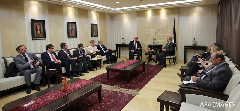 Palestinian Prime Minister, Rami Hamdallah meets with Poland's foreign minister, Witold Waszczykowski, in the West Bank city of Ramallah, June 15, 2016. Photo by Prime Minister Office